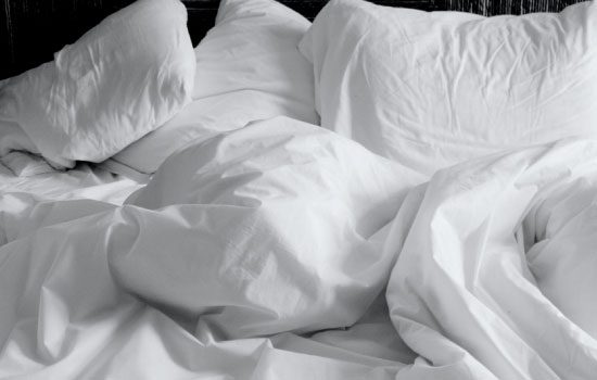 bed sheets closeup natural insomnia remedies