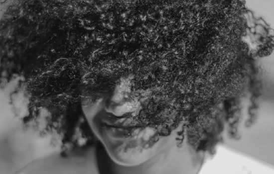 black and white curly hair